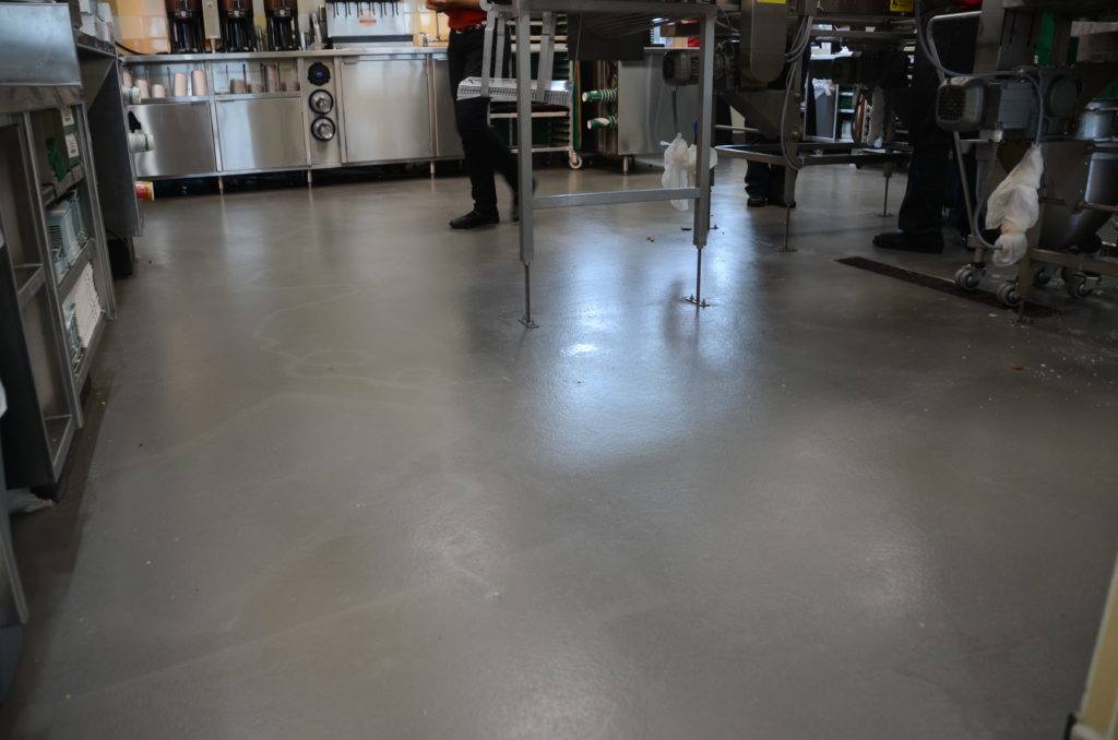 This is a picture of a commercial kitchen epoxy floor.